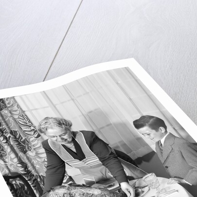 1950s grandmother grandson turkey thanksgiving dinner by Anonymous