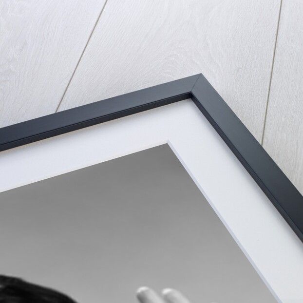 1960s woman looking at camera holding up hand palm forward commanding stop by Anonymous