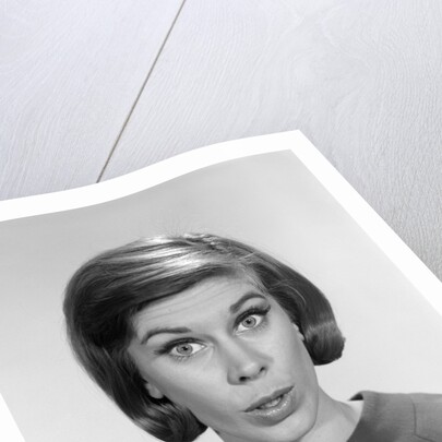 1960s woman portrait looking at camera asking question wonder puzzled funny face expression by Anonymous
