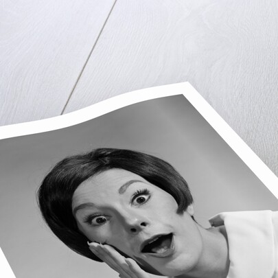 1960s brunette woman mouth agape eyes wide hand to cheek funny face expression shock surprise anger amazed by Anonymous