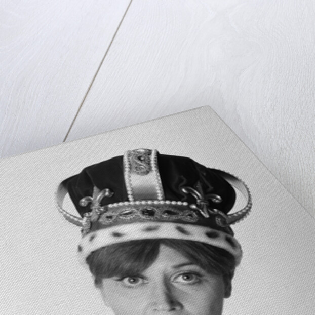 1970s portrait woman wearing queen's crown looking at camera by Anonymous