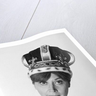 1970s portrait woman wearing queen's crown looking at camera by Anonymous