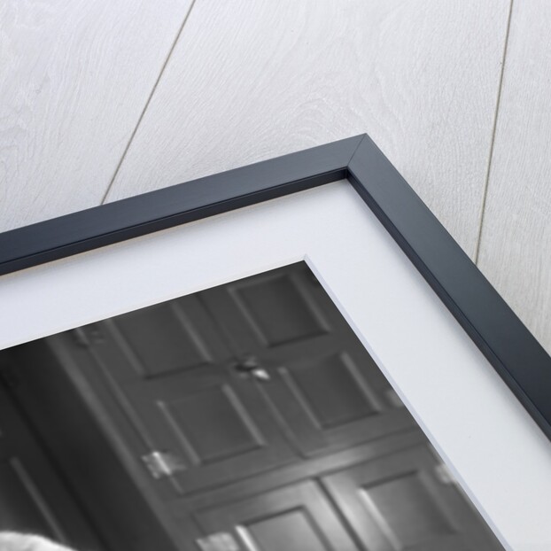 1930s woman in kitchen making strawberry shortcake by Anonymous