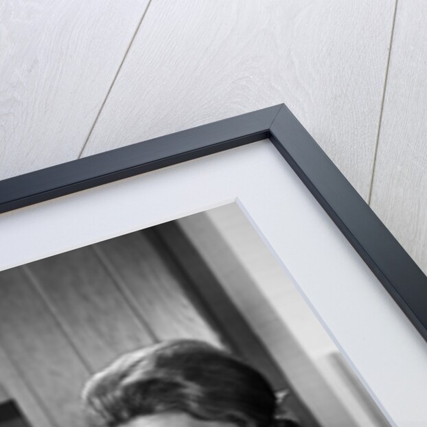 1960s woman housewife baking biscuits in kitchen by Anonymous