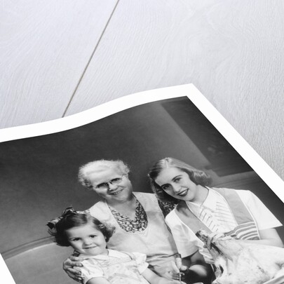 1940s 1950s mother daughter grandmother stuffing turkey by Anonymous