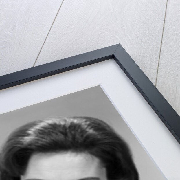 1960s woman reading story book to girl child by Anonymous