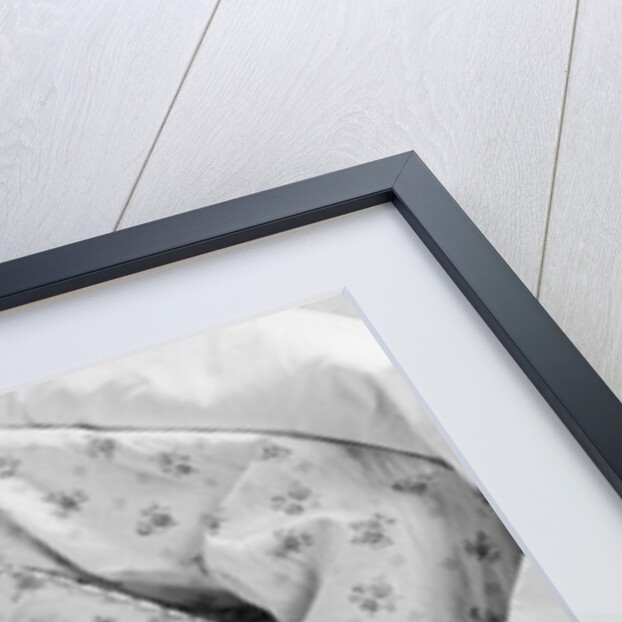 1950s child little girl sleeping in bed with doll by Anonymous