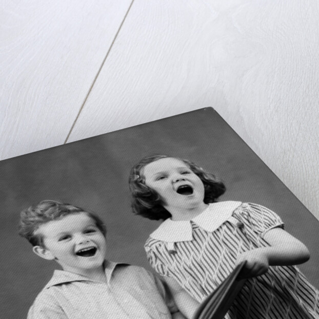 1930s two children standing singing by Anonymous