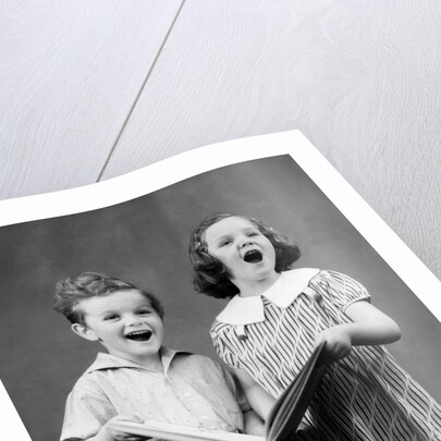 1930s two children standing singing by Anonymous