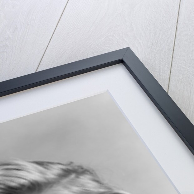 1950s portrait smiling girl with white collar plaid dress looking at camera by Anonymous