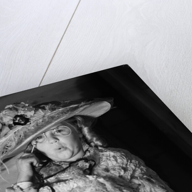 1950s girl play dress up in her mothers clothes hat glasses spectacles facial expression role playing age aging by Anonymous