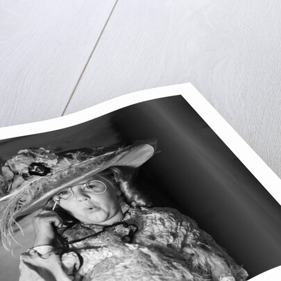 1950s girl play dress up in her mothers clothes hat glasses spectacles facial expression role playing age aging by Anonymous