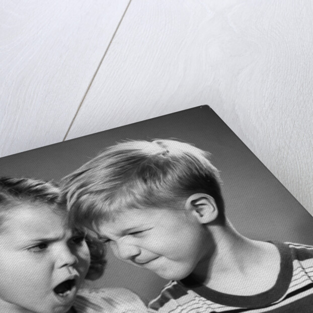 1950s boy and girl arguing head to head by Anonymous