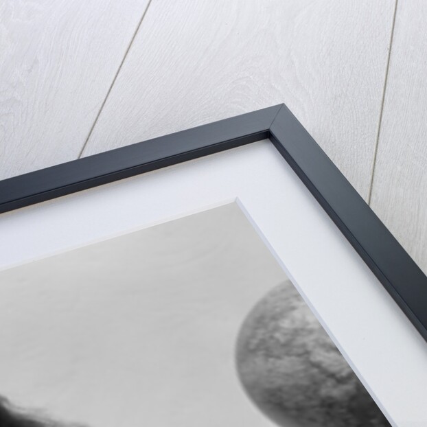 1930s child smiling girl putting money coin into toy cash register bank by Anonymous