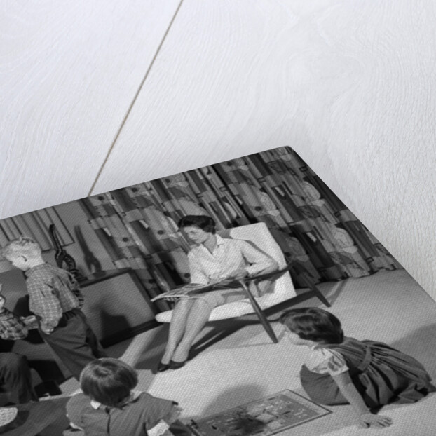 1960s family of four in living room boy is being disciplined by dad shaking finger by Anonymous