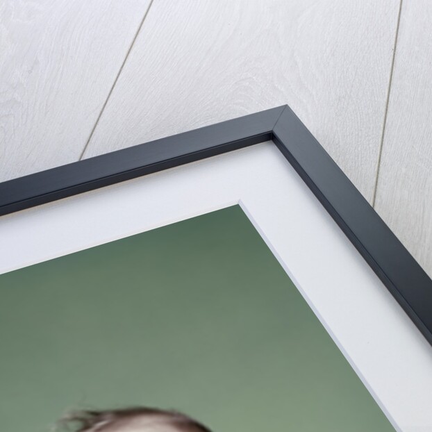 1960s smiling baby girl sitting in diapers hand touching world globe by Anonymous