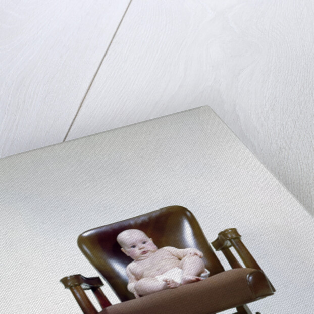1960s chubby baby in diaper sitting in office executive chair by Anonymous
