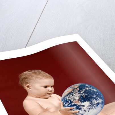 1960s symbolic ecology serious baby wearing cloth diapers sitting holding looking at the earth by Anonymous