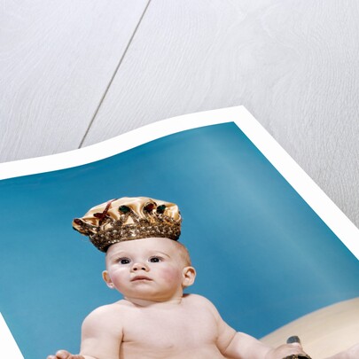 1960s baby wearing cloth diaper and crown holding a scepter by Anonymous