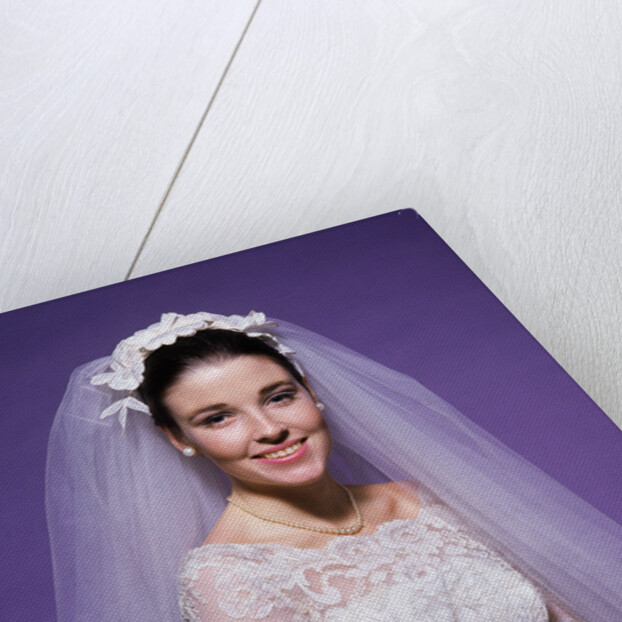1960s young woman bride portrait bridal veil head shoulders smiling pearls by Anonymous