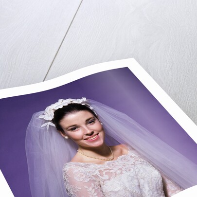 1960s young woman bride portrait bridal veil head shoulders smiling pearls by Anonymous
