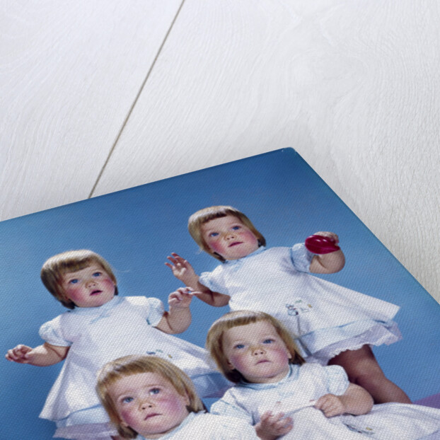 1950s 1960s quadruplet portrait 4 red haired girls wearing dresses two seated 2 standing by Anonymous
