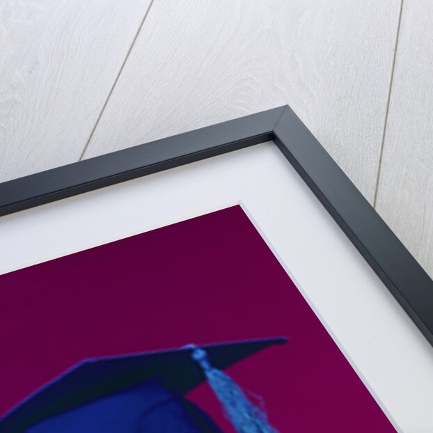 1960s graduate baby wearing mortarboard eyeglasses reading book by Anonymous