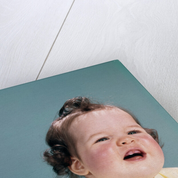 1960s smiling baby open mouth showing two new teeth gums teething by Anonymous