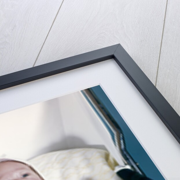 1950s 1960s twin boys dressed in white lying in stroller side by side by Anonymous