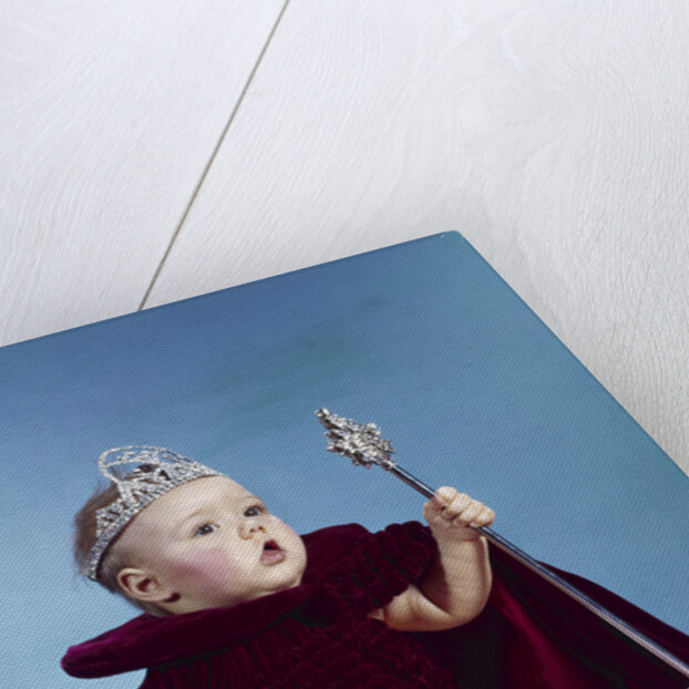 1960s baby dressed as royal queen in a velvet robe cloak cape rhinestone tiara crown and scepter wand by Anonymous