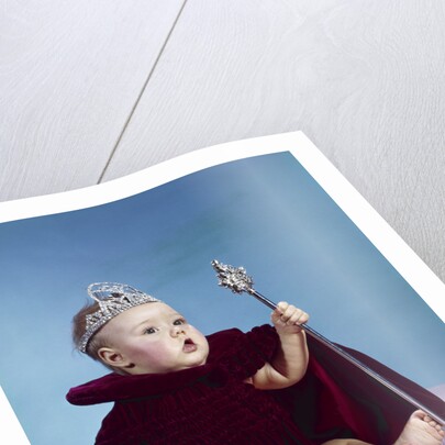 1960s baby dressed as royal queen in a velvet robe cloak cape rhinestone tiara crown and scepter wand by Anonymous