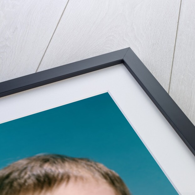 1960s portrait sweet brunette baby blue eyes looking up by Anonymous