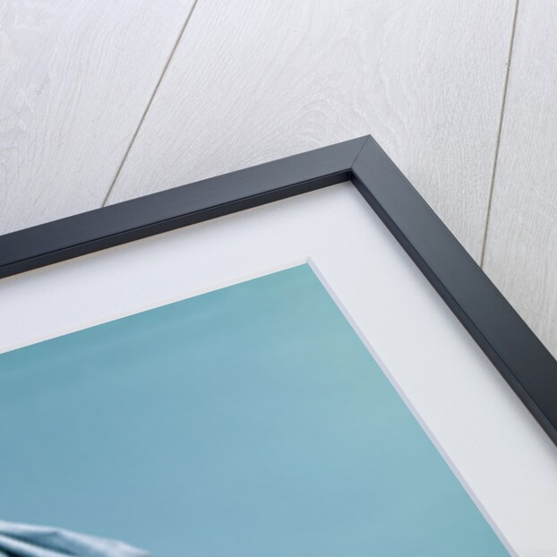 1960s baby sitting with ice pack on top of head by Anonymous