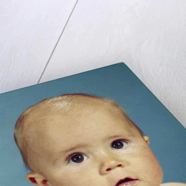 1960s portrait adorable sincere baby looking at camera by Anonymous