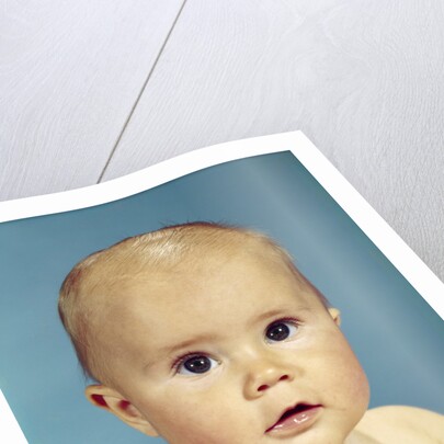 1960s portrait adorable sincere baby looking at camera by Anonymous