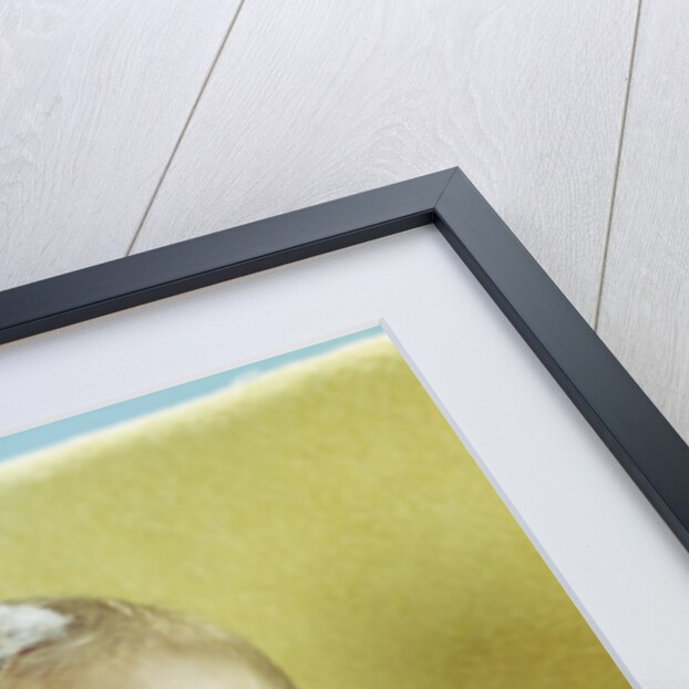 1960s smiling baby in bath looking up by Anonymous