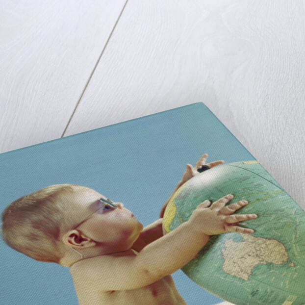1960s baby wearing eyeglasses hugging the world globe earth by Anonymous