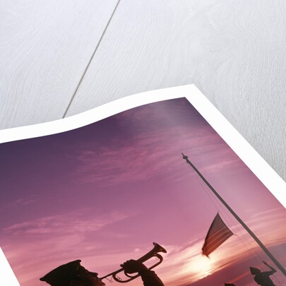 1960s boy scout blowing bugle as others raise american flag at camp sunset ceremony by Anonymous