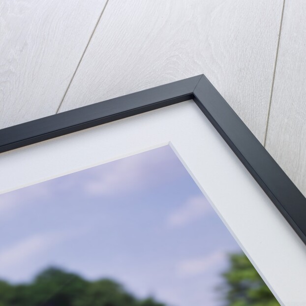 1970s 1960s smiling blond boy leaning over handlebars of bicycle looking at camera by Anonymous