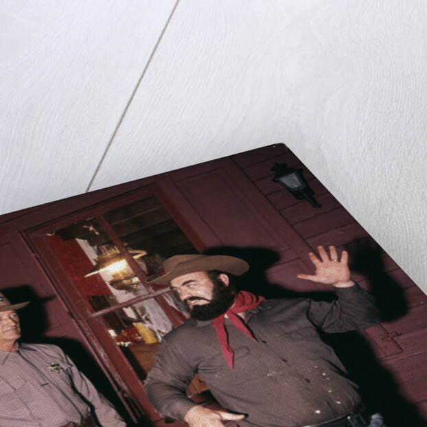 1960s 1970s western sheriff arrests bearded cowboy about to draw gun by Anonymous