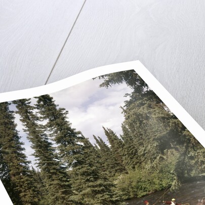 1970s couple man woman fishing in stream campsite with tent by Anonymous