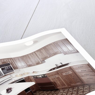 1970s kitchen with dark wooden cabinets and a microwave oven over the stove by Anonymous
