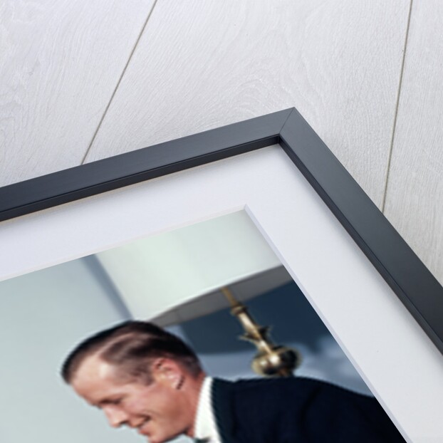 1960s three generation family with birthday cake by Anonymous