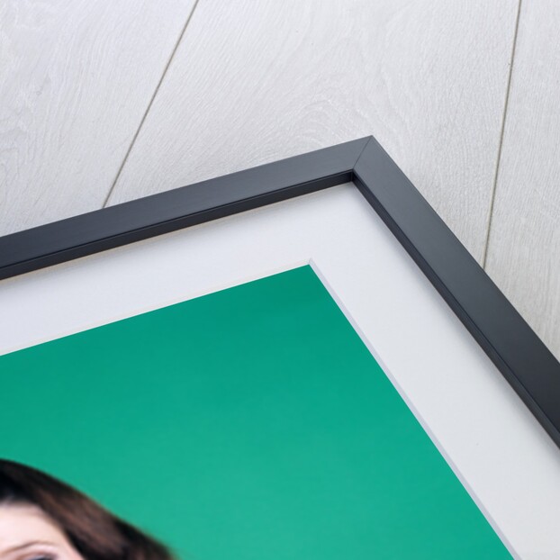 1960s smiling young woman brunette red coat leopard skin fur collar by Anonymous