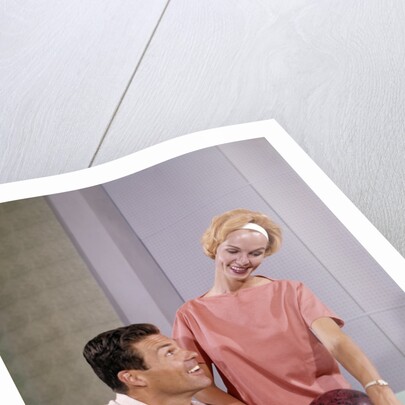 1960s couple husband wife bowling checking the score indoor by Anonymous