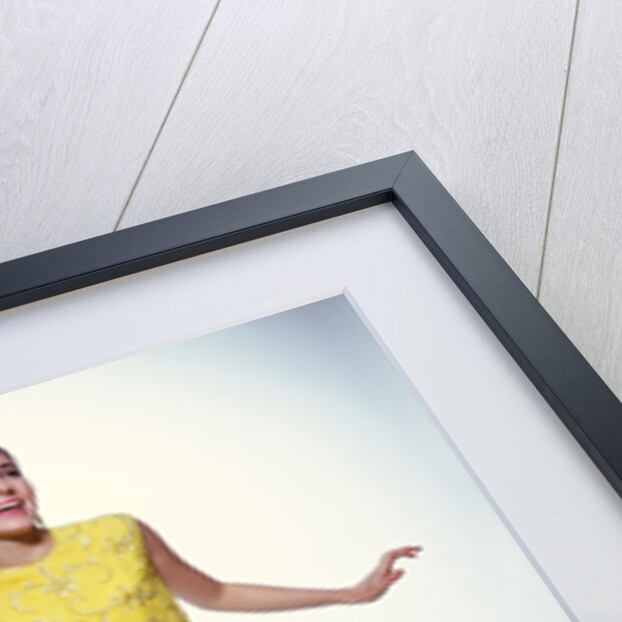 1960s smiling brunette woman modeling yellow sequined cocktail dress clothes by Anonymous