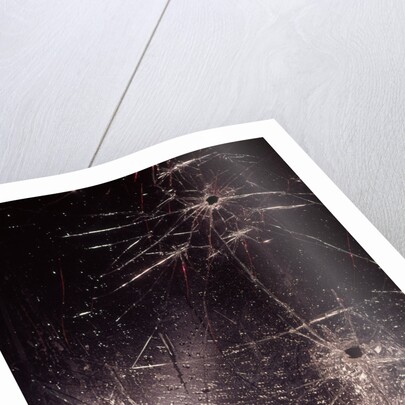 1970s bullet holes and raindrops on shattered glass windshield by Anonymous