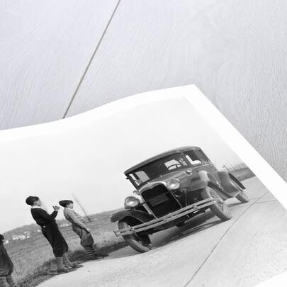 1930s 1920s man driving ford model a car 3 boys hitchhiking by Anonymous