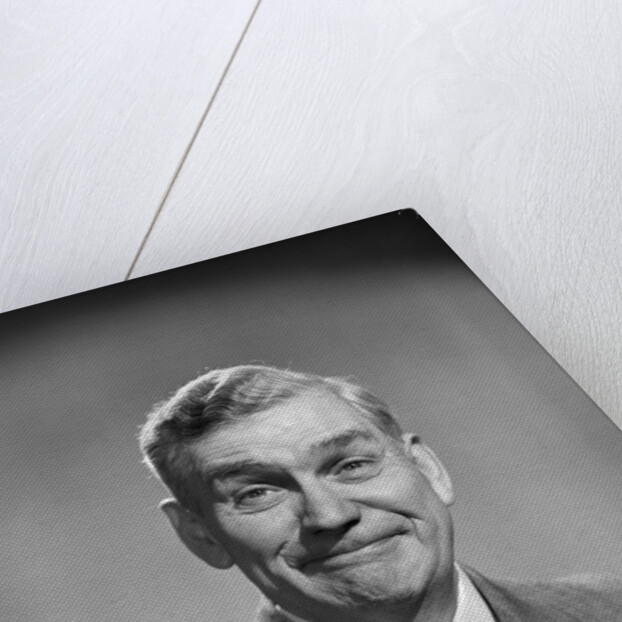 1950s mature middle aged man smiling business suit tie happy amused funny face expression by Anonymous