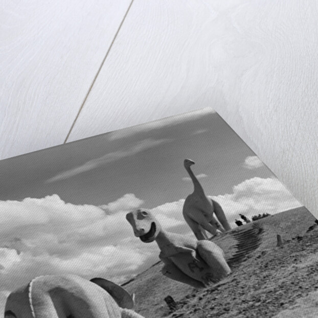 1950s dinosaur park south dakota three dinosaur statues on hillside by Anonymous